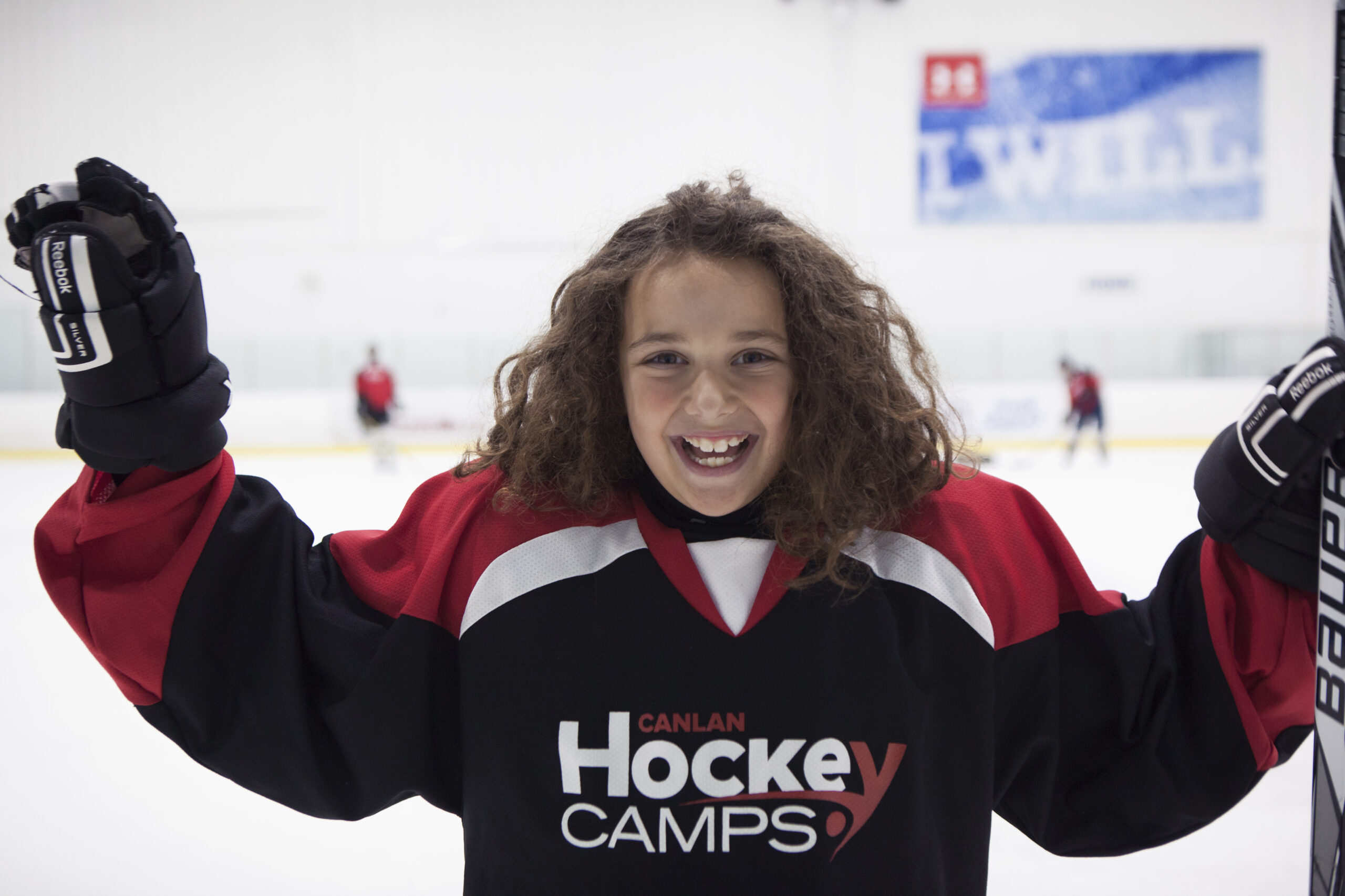 Girl-excited-for-hockey-camps