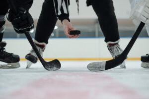 Referee dropping the puck